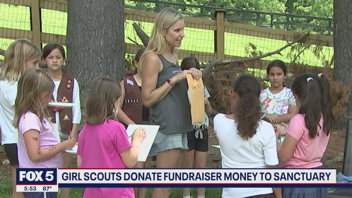 Girl Scouts donate fundraiser money to animal sanctuary